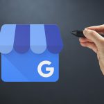 Logo Google my business avec une main qui tient un stylet