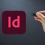 Logo Indesign avec une main qui tient un stylet